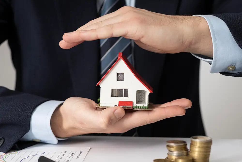 Person Holding House - Can I Live in My SMSF Property When I Retire